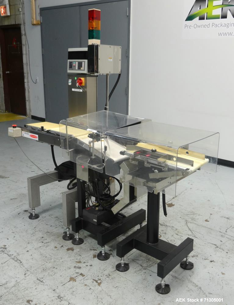 Used Ishida Model DACS-W-012-SB/PB-I Checkweigher System