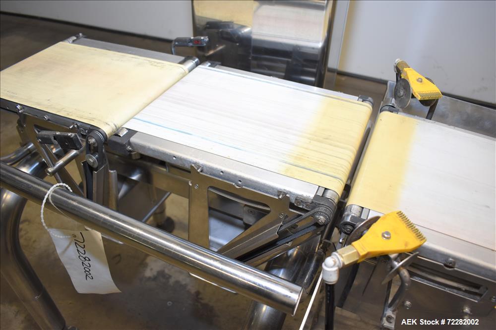 Used Ishida Belt Checkweigher, Model DACS. Checkweigher range is 0 to 1500 grams