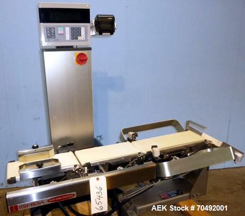 Used Ishida DACS Belt Checkweigher, Model DACS-W-003-SB/PB-I. Weighing range 3 to 300 gram, weighing speed maximum 330 WPM, weighing accuracy +/- 0.2g, minimum gradation 0.1g. Product dimensions:leng...