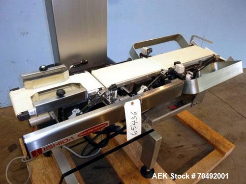 Used Ishida DACS Belt Checkweigher, Model DACS-W-003-SB/PB-I. Weighing range 3 to 300 gram, weighing speed maximum 330 WPM, weighing accuracy +/- 0.2g, minimum gradation 0.1g. Product dimensions:leng...