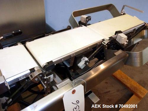 Used Ishida DACS Belt Checkweigher, Model DACS-W-003-SB/PB-I. Weighing range 3 to 300 gram, weighing speed maximum 330 WPM, weighing accuracy +/- 0.2g, minimum gradation 0.1g. Product dimensions:leng...