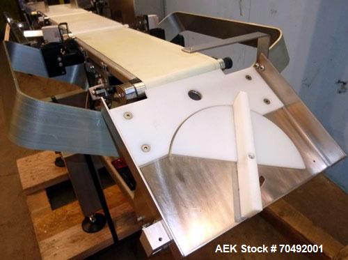 Used Ishida DACS Belt Checkweigher, Model DACS-W-003-SB/PB-I. Weighing range 3 to 300 gram, weighing speed maximum 330 WPM, weighing accuracy +/- 0.2g, minimum gradation 0.1g. Product dimensions:leng...