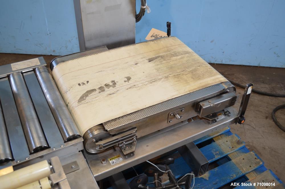 Used Ishida Model DACSW180SBWPN 18 Kg Maximum Capacity Full Case, Shipper sized Checkweigher with Reject Conveyor Section. Weighing range of 180 g - 18 kg. Maximum weighing speed 84 WPM. Weighing acc...