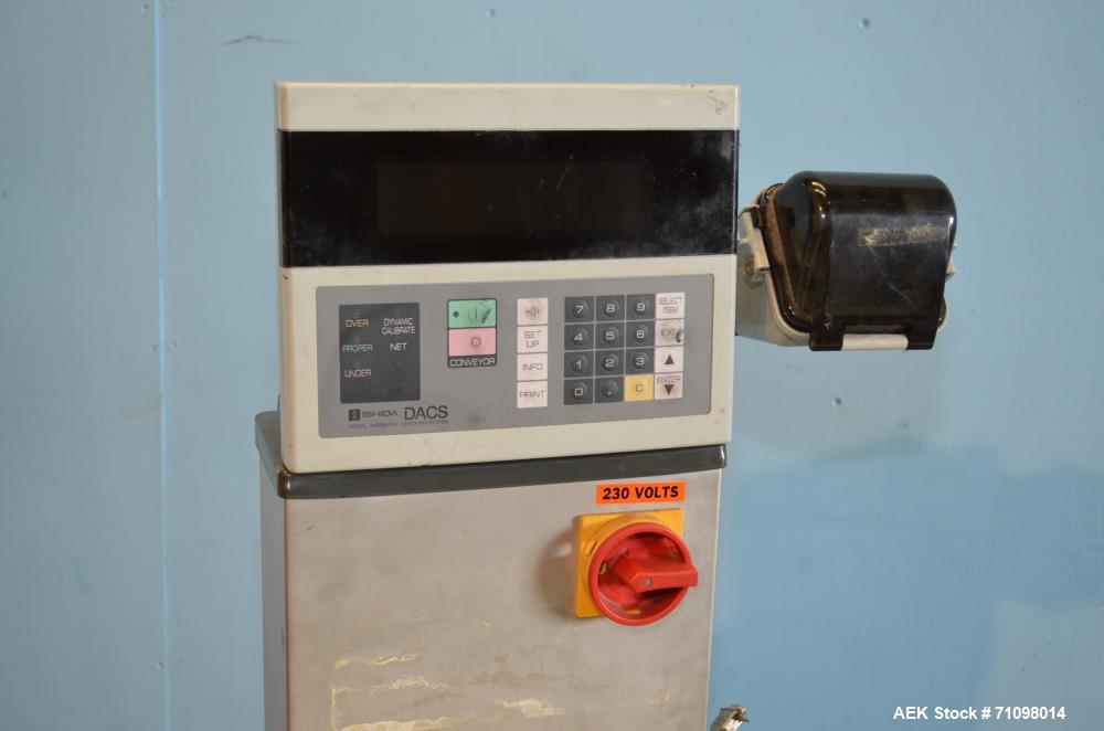 Used Ishida Model DACSW180SBWPN 18 Kg Maximum Capacity Full Case, Shipper sized Checkweigher with Reject Conveyor Section. Weighing range of 180 g - 18 kg. Maximum weighing speed 84 WPM. Weighing acc...