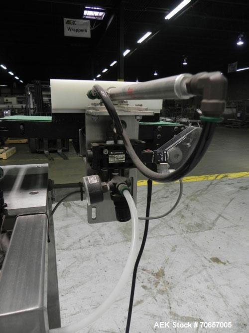 Used Lock Model Weigh Chek CK2500 Belt Checkweigher. Machine is capable of speeds up to 300 cases per minute (dependent on case size). Has a package weight range of 10 of 2500 g and a weight cell cap...