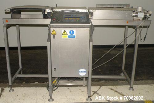 Used Loma Belt Checkweigher, Series 7000. Capable of speeds up to, weight range to 20 kg. Conveyor speed 57.8 meter per minute. 12/1/2" wide x 26" long infeed belt, 13" wide x 19" long weigh section ...