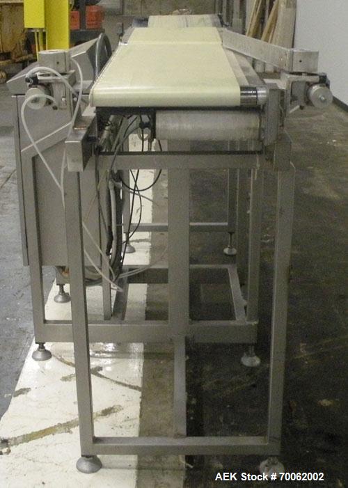 Used Loma Belt Checkweigher, Series 7000. Capable of speeds up to, weight range to 20 kg. Conveyor speed 57.8 meter per minute. 12/1/2" wide x 26" long infeed belt, 13" wide x 19" long weigh section ...