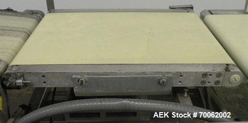 Used Loma Belt Checkweigher, Series 7000. Capable of speeds up to, weight range to 20 kg. Conveyor speed 57.8 meter per minute. 12/1/2" wide x 26" long infeed belt, 13" wide x 19" long weigh section ...