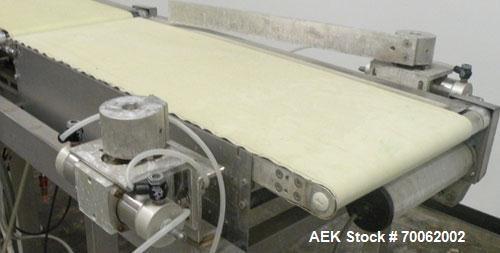 Used Loma Belt Checkweigher, Series 7000. Capable of speeds up to, weight range to 20 kg. Conveyor speed 57.8 meter per minute. 12/1/2" wide x 26" long infeed belt, 13" wide x 19" long weigh section ...