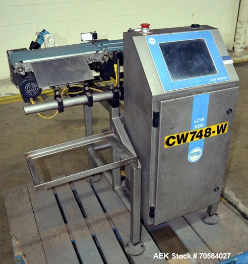 Used Loma Systems Belt Check Weigher, Model LCW-3000. Built 2007.7"W x 12"L infeed belt, 7"W x 12" load cell belt, 7"W x 16"L discharge belt with air blast reject, weights up to 6.5# (3,000 g).