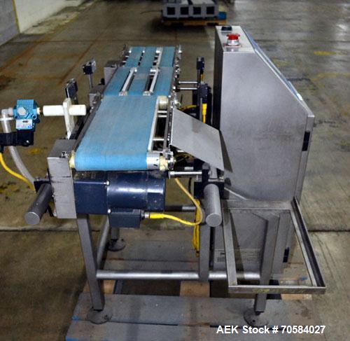 Used Loma Systems Belt Check Weigher, Model LCW-3000. Built 2007.7"W x 12"L infeed belt, 7"W x 12" load cell belt, 7"W x 16"L discharge belt with air blast reject, weights up to 6.5# (3,000 g).