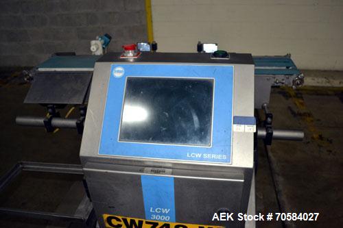 Used Loma Systems Belt Check Weigher, Model LCW-3000. Built 2007.7"W x 12"L infeed belt, 7"W x 12" load cell belt, 7"W x 16"L discharge belt with air blast reject, weights up to 6.5# (3,000 g).
