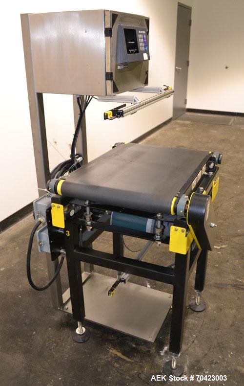 Used Mettler Toledo Model 9482 ExpressWeigh Checkweigher. Capable of 15 to 100 cartons per minute. Consisting of:  (1) Model 9482 Expressweigh controller, (1) Jagxtreme controller, (1) Model 9477 bel...