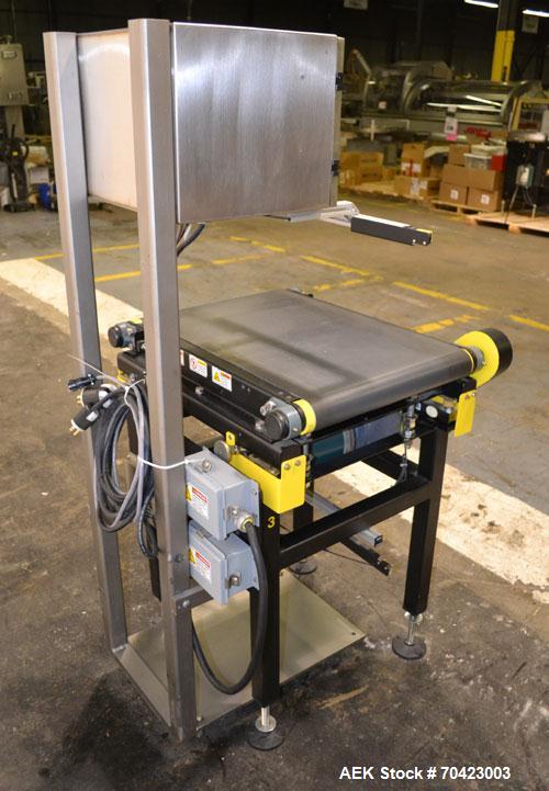 Used Mettler Toledo Model 9482 ExpressWeigh Checkweigher. Capable of 15 to 100 cartons per minute. Consisting of:  (1) Model 9482 Expressweigh controller, (1) Jagxtreme controller, (1) Model 9477 bel...