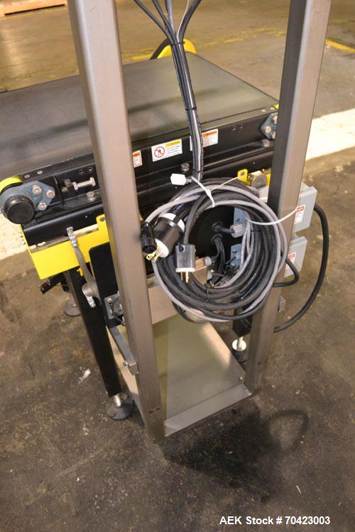 Used Mettler Toledo Model 9482 ExpressWeigh Checkweigher. Capable of 15 to 100 cartons per minute. Consisting of:  (1) Model 9482 Expressweigh controller, (1) Jagxtreme controller, (1) Model 9477 bel...