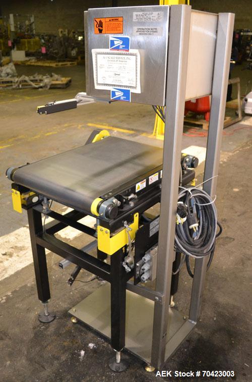 Used Mettler Toledo Model 9482 ExpressWeigh Checkweigher. Capable of 15 to 100 cartons per minute. Consisting of:  (1) Model 9482 Expressweigh controller, (1) Jagxtreme controller, (1) Model 9477 bel...