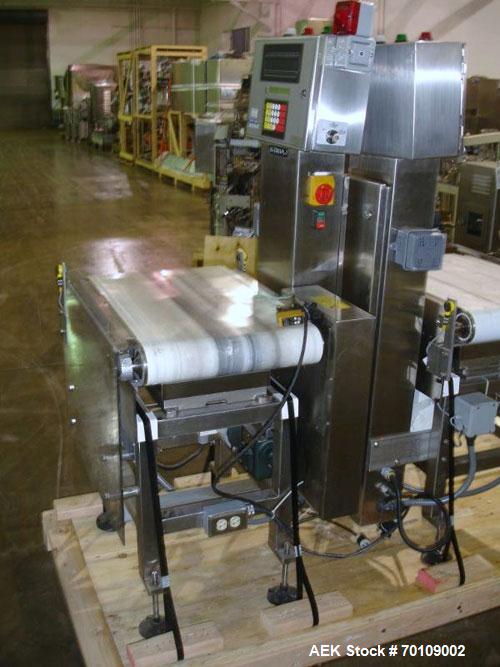 Used Mettler Toledo Hi-Speed Checkweigher, Model CS34000WD-mm.; 18" wide x 27" long belt. Mounted on a stainless steel frame with a Micromate control panel.