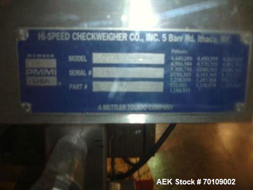 Used Mettler Toledo Hi-Speed Checkweigher, Model CS34000WD-mm.; 18" wide x 27" long belt. Mounted on a stainless steel frame with a Micromate control panel.
