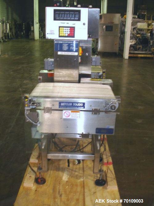 Used Mettler Toledo Hi-Speed Checkweigher, Model CS34000WD-mm.; 18" wide x 27" long belt. Mounted on a stainless steel frame with a Micromate control panel.