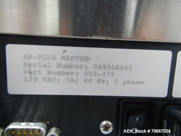 Used Mocon Automatic Balance Checkweigher with Mocon automatic sorter, model AB-Plus Master, speeds from 20-45 units/minute, 1-0.1 mg readability, serial #0499AX065.