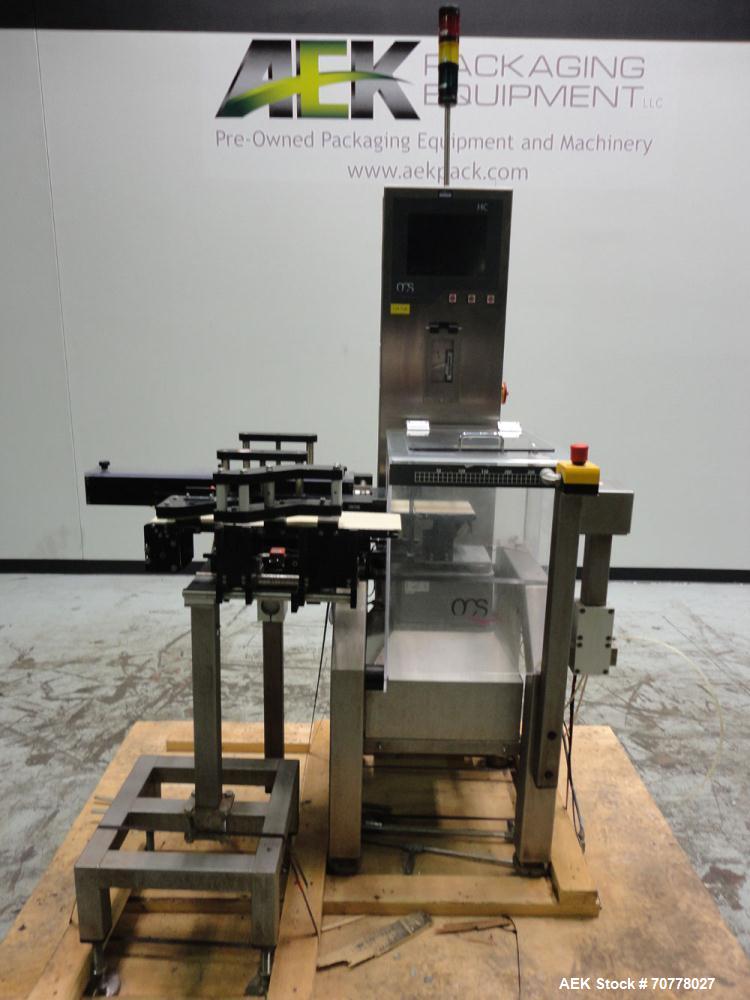 Used OCS Model HC Belt Checkweigher. Machine is capable of speeds up to 100 packages per minute. Has wormscrew infeed with belt load cell and discharge. Maximum weight capacity: 750g with accuracies ...
