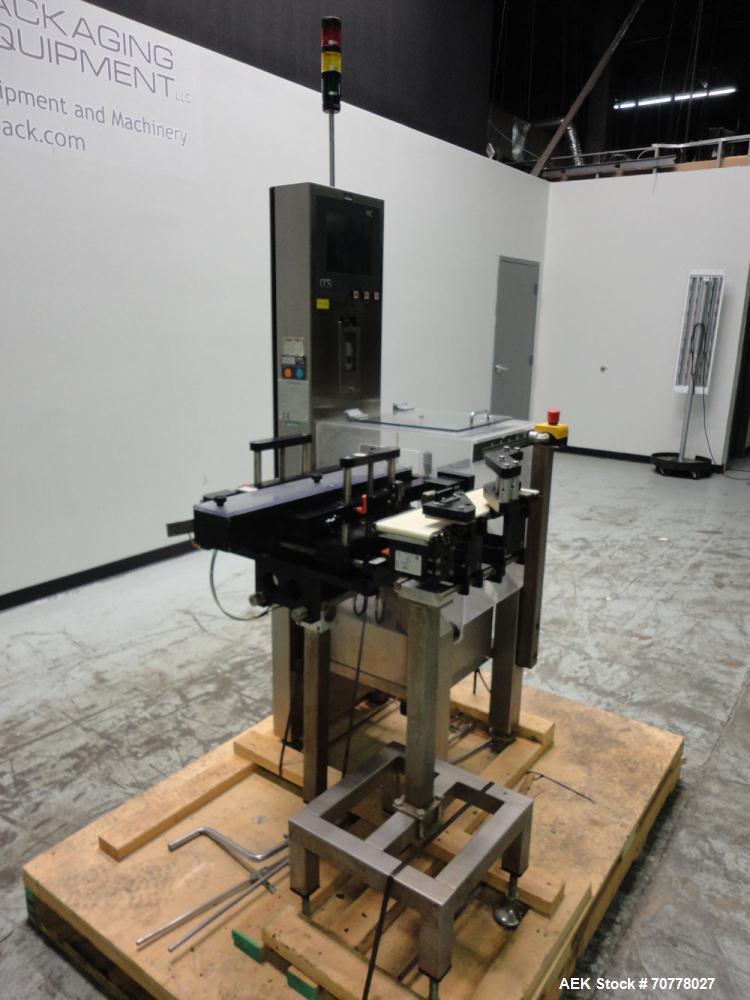 Used OCS Model HC Belt Checkweigher. Machine is capable of speeds up to 100 packages per minute. Has wormscrew infeed with belt load cell and discharge. Maximum weight capacity: 750g with accuracies ...