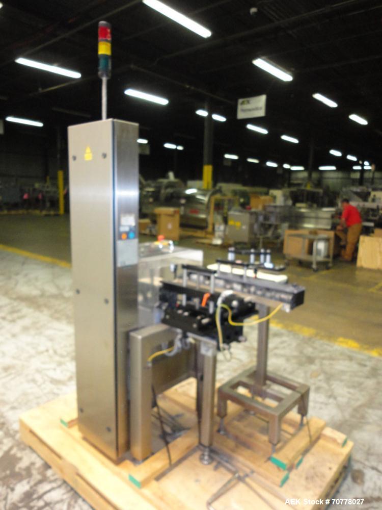 Used OCS Model HC Belt Checkweigher. Machine is capable of speeds up to 100 packages per minute. Has wormscrew infeed with belt load cell and discharge. Maximum weight capacity: 750g with accuracies ...