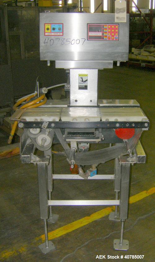 Used Ramsey Check Weigher, Model MK II/FR10/SS. 27" long x 7" wide mylar belt. Approximately 6 1/2" wide x 9" long weigh area.Includes control panel.Mounted on a stainless steel frame on 4 thread rod...