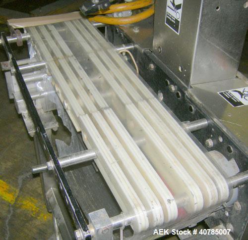 Used Ramsey Check Weigher, Model MK II/FR10/SS. 27" long x 7" wide mylar belt. Approximately 6 1/2" wide x 9" long weigh area.Includes control panel.Mounted on a stainless steel frame on 4 thread rod...