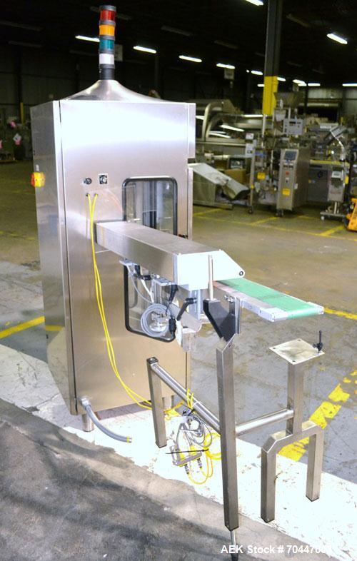 Used Thermo Ramsey Icore AutoCheck 9000 Plus Automatic Belt Checkweigher with worm screw infeed and reject system. Capable of speeds up to 550 containers per minute. Accuracies of +/- 50mg. Has a wei...