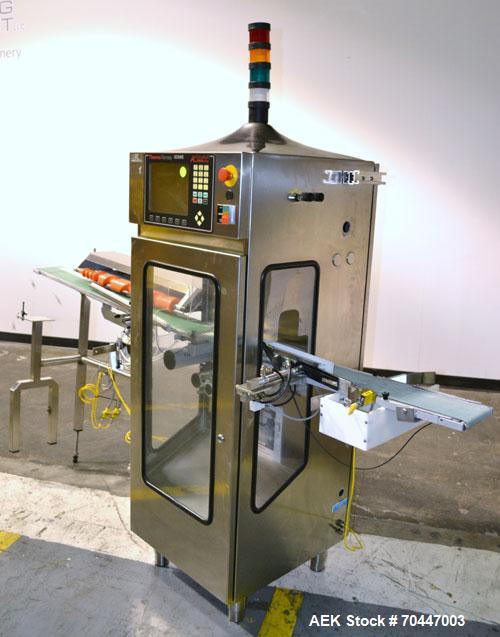 Used Thermo Ramsey Icore AutoCheck 9000 Plus Automatic Belt Checkweigher with worm screw infeed and reject system. Capable of speeds up to 550 containers per minute. Accuracies of +/- 50mg. Has a wei...