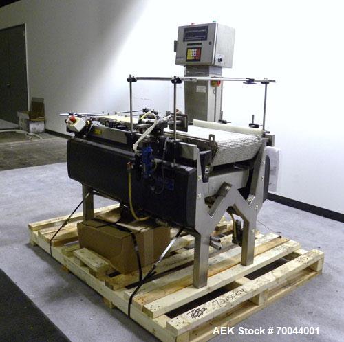 Used Mettler Toledo Hi-Speed Micromate Checkweigher, Model Beltway MM. 8" wide x 13" long infeed rubber belt, 8" wide x 17" long rubber weight belt, 16" wide x 24" long plastic discharge belt with ai...
