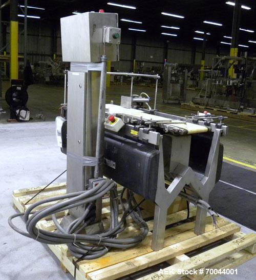 Used Mettler Toledo Hi-Speed Micromate Checkweigher, Model Beltway MM. 8" wide x 13" long infeed rubber belt, 8" wide x 17" long rubber weight belt, 16" wide x 24" long plastic discharge belt with ai...
