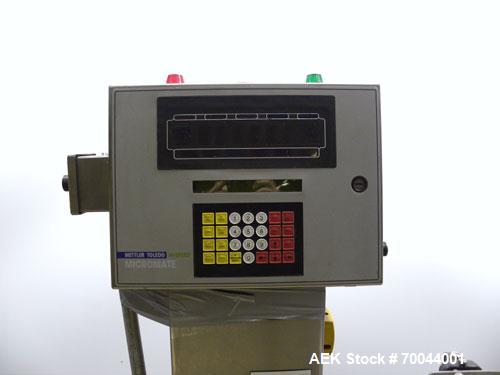 Used Mettler Toledo Hi-Speed Micromate Checkweigher, Model Beltway MM. 8" wide x 13" long infeed rubber belt, 8" wide x 17" long rubber weight belt, 16" wide x 24" long plastic discharge belt with ai...
