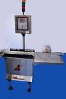 Used Alpha (All-Fill) Model CW-10 Checkweigher. Capable of speeds up to 300 packages per minute. Can handle package weights up to 10 lbs with dimensions up to 15