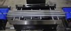 Used Alpha (All-Fill) Model CW-10 Checkweigher. Capable of speeds up to 250 packages per minute. Can handle package weights up to 9 lbs with dimensions up to 15