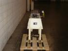 Used Yamato CA15L-00 Checkweigher. Weight range from 10g to 1500g with accuracy of +/- 1 gram. Last weighing cartons of ice cream cones. Dimensions: 31