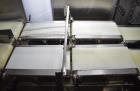 Used Bizerba Model CWD Dual Lane Checkweigher With Reject. Weight range: 600/1500 grams with accuracies 0.2/0.5 grams.