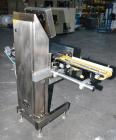 Used Garvens Model E2 Three Belt Checkweigher capable of speeds up to 200 containers per minute. Has a maximum weight range up to 600 grams. Has an air reject. 1/60/110V. Built 2004.