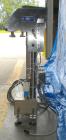 Used Hi Speed Mettler Toledo Container Checkweigher, Model SST1100SS-CM. Stainless steel side belt load cell mechanism with a weight range up to 50 pounds. Capable of speeds up to 250 packages per mi...