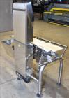 Used Ishida Belt Checkweigher, Model DACS. Checkweigher range is 0 to 1500 grams