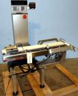 Used Ishida DACS Belt Checkweigher, Model DACS-W-003-SB/PB-I. Weighing range 3 to 300 gram, weighing speed maximum 330 WPM, weighing accuracy +/- 0.2g, minimum gradation 0.1g. Product dimensions:leng...