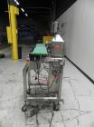 Used Lock Model Weigh Chek CK2500 Belt Checkweigher. Machine is capable of speeds up to 300 cases per minute (dependent on case size). Has a package weight range of 10 of 2500 g and a weight cell cap...