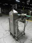 Used Lock Model Weigh Chek CK2500 Belt Checkweigher. Machine is capable of speeds up to 300 cases per minute (dependent on case size). Has a package weight range of 10 of 2500 g and a weight cell cap...