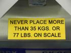 Used Lock Model Weigh Chek CK2500 Belt Checkweigher. Machine is capable of speeds up to 300 cases per minute (dependent on case size). Has a package weight range of 10 of 2500 g and a weight cell cap...