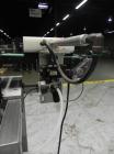 Used Lock Model Weigh Chek CK2500 Belt Checkweigher. Machine is capable of speeds up to 300 cases per minute (dependent on case size). Has a package weight range of 10 of 2500 g and a weight cell cap...