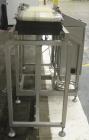 Used Loma Belt Checkweigher, Series 7000. Capable of speeds up to, weight range to 20 kg. Conveyor speed 57.8 meter per minute. 12/1/2