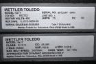 Used Mettler Toledo Model 9482 ExpressWeigh Checkweigher. Capable of 15 to 100 cartons per minute. Consisting of:  (1) Model 9482 Expressweigh controller, (1) Jagxtreme controller, (1) Model 9477 bel...