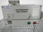 Used Mocon Automatic Balance Checkweigher with Mocon automatic sorter, model AB-Plus Master, speeds from 20-45 units/minute, 1-0.1 mg readability, serial #0499AX065.