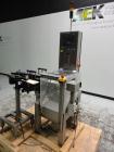 Used OCS Model HC Belt Checkweigher. Machine is capable of speeds up to 100 packages per minute. Has wormscrew infeed with belt load cell and discharge. Maximum weight capacity: 750g with accuracies ...